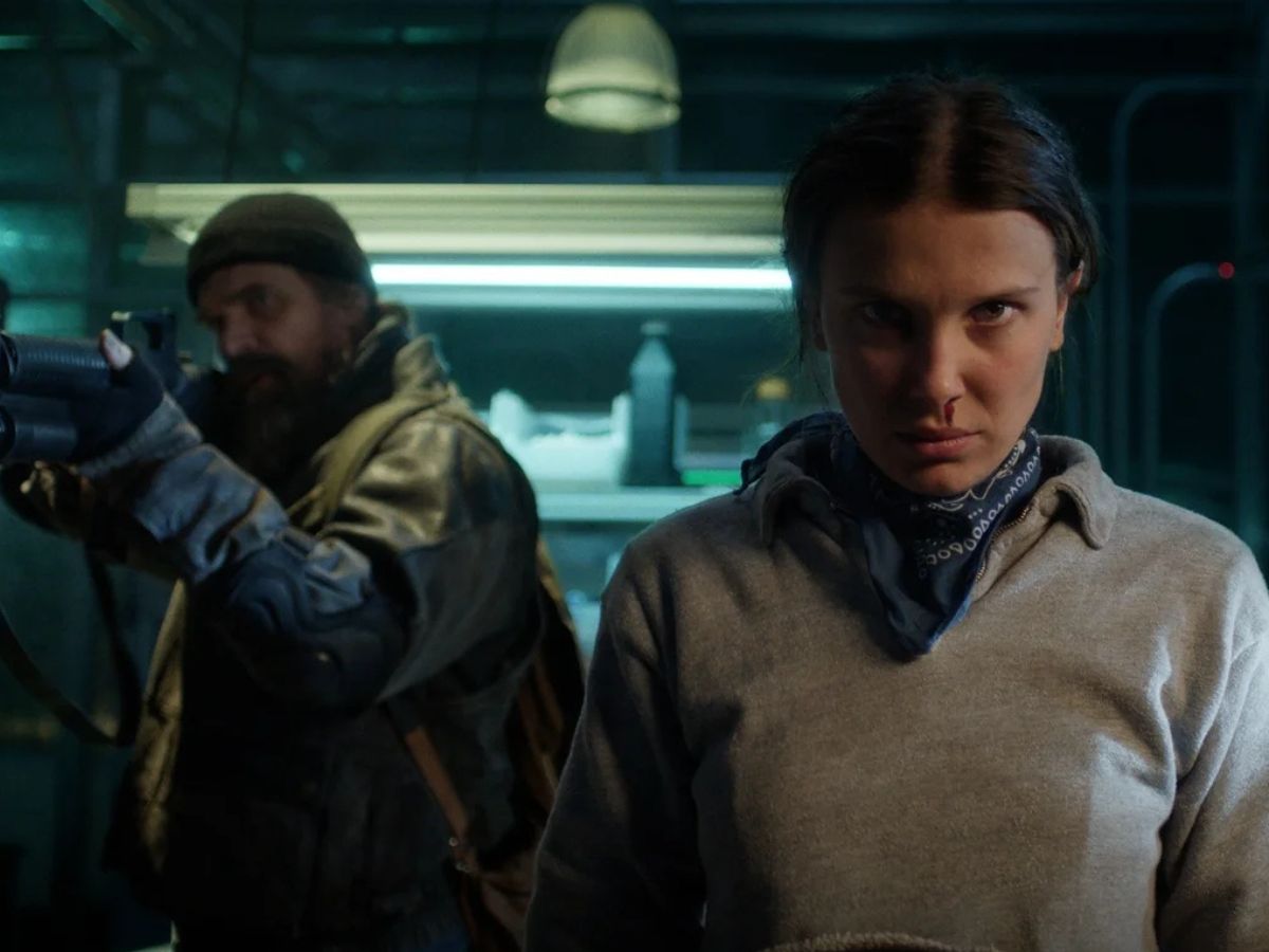 Millie Bobby Brown e David Harbour na série "Stranger Things” (Foto/Netflix)